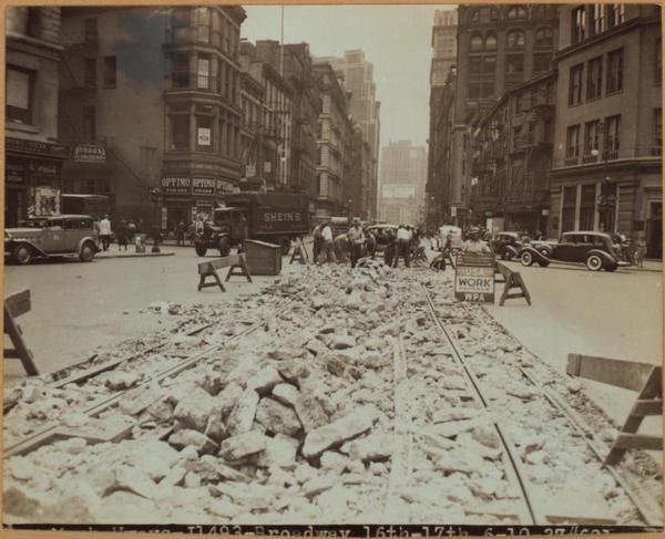 Union Square West, north from East 15th Street, showing removal of the 8roadway streetoar tracks by the Works Progress Administration, 1937.
