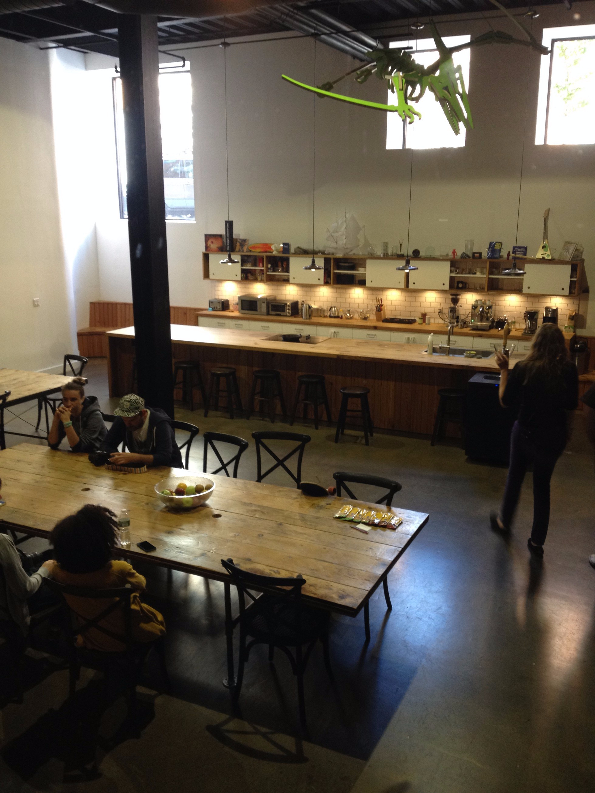 The kitchen and the dining room, a large shared open space.